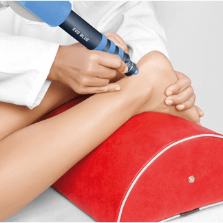 Patient receiving Shockwave Therapy treatment for a tendon injury